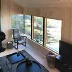 Architect Drawn Between Sea And Mountain